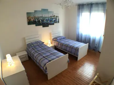 Letto o letti in una camera di Appartamenti Giacomo Noventa