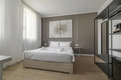 Letto o letti in una camera di Cima Suite 11 by WelcHome