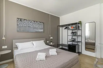Letto o letti in una camera di Cima Suite 12 by WelcHome