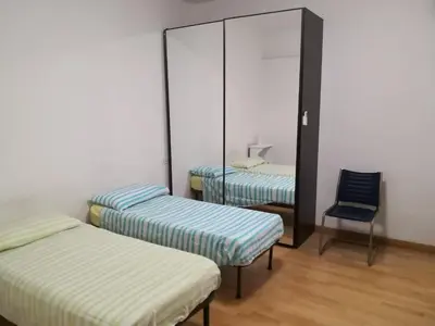 Letto o letti in una camera di Via Vecchia 66