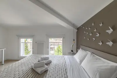 Letto o letti in una camera di Cima Suite 15 by WelcHome