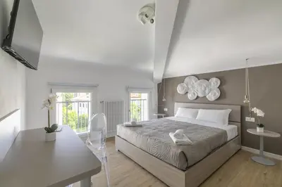 Letto o letti in una camera di Cima Suite 16 by WelcHome