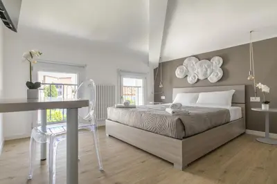 Letto o letti in una camera di Cima Suite 16 by WelcHome