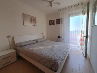 Letto o letti in una camera di Appartamento Isola Verde Chioggia