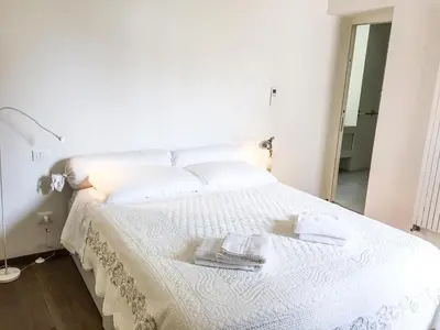 Letto o letti in una camera di Ca Farnese, beautiful big apartment in trad area