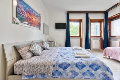 Letto o letti in una camera di Arish Downtown Venice Apartment