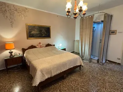 Letto o letti in una camera di Ritz Venice Guest House Lionsclass