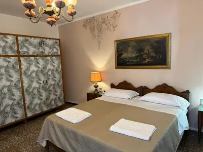 Letto o letti in una camera di Ritz Venice Guest House Lionsclass
