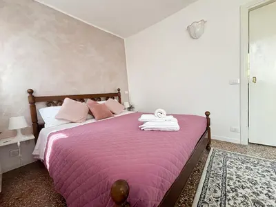 Letto o letti in una camera di Ca' Sunshine Your Home in San Marcuola Venice