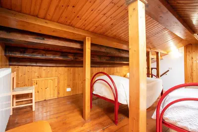 Letto o letti in una camera di Dimora Sara-Isola di Pellestrina VE