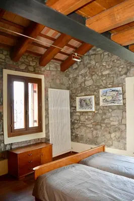 Letto o letti in una camera di Domus Tito Livius