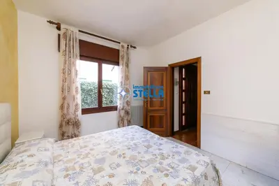 Letto o letti in una camera di Casa Augustus