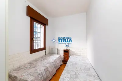 Letto o letti in una camera di Casa Augustus