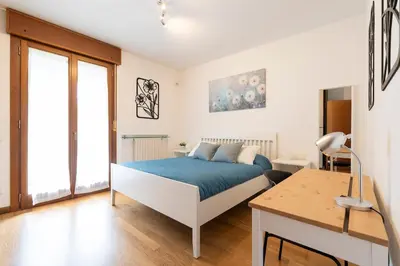 Letto o letti in una camera di EnJoy Home - La Quercia