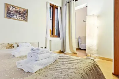 Letto o letti in una camera di Best Venice Apartments Torre dell'Orologio