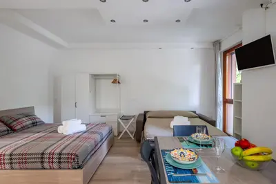 Letto o letti in una camera di GuestHost - Padova cozy apartments near the Hospital