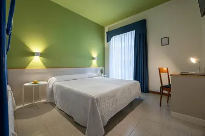 Letto o letti in una camera di Hotel Portofino