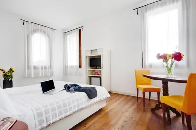 Letto o letti in una camera di Hotel Due Mori