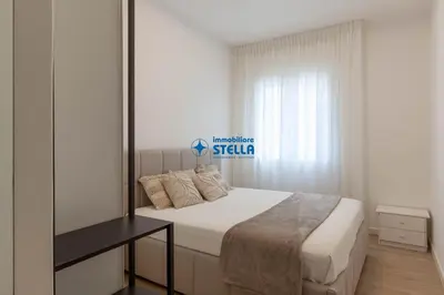 Letto o letti in una camera di Condominio Rinascita