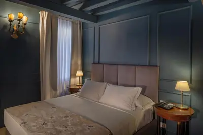 Letto o letti in una camera di San Simeon Suite