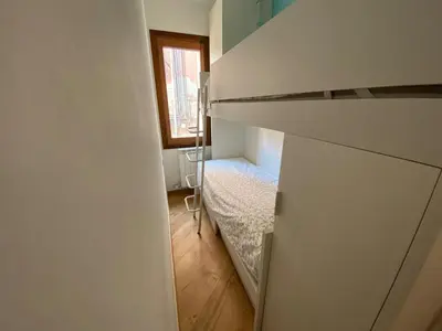 Letto o letti in una camera di Casa MammaMarisa