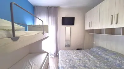 Letto o letti in una camera di Casa Azzurra Zona Bau Bau Beach