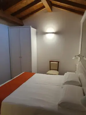 Letto o letti in una camera di Casanova Fourrooms