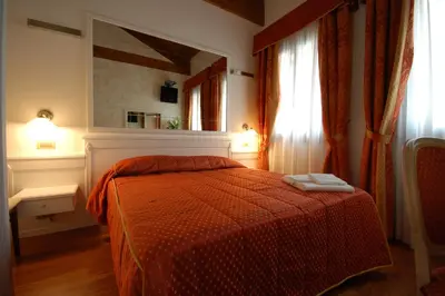 Letto o letti in una camera di Casanova Fourrooms