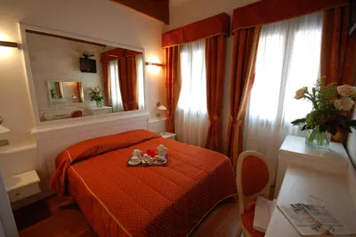 Letto o letti in una camera di Casanova Fourrooms