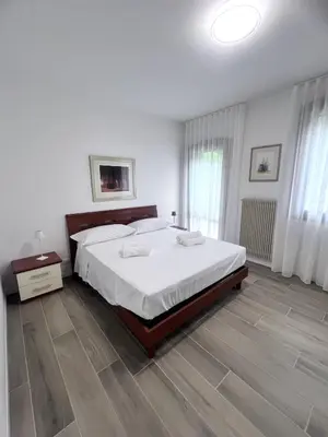Letto o letti in una camera di Casa Beatrice intero appartamento