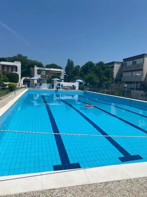 Piscina di Spacious apartment in Isola Verde for 5 people Ca' Zadra o nelle vicinanze