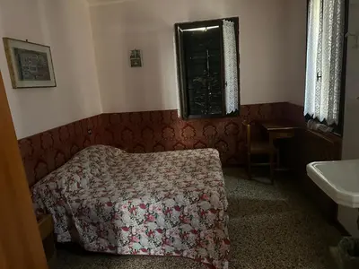 Letto o letti in una camera di Hotel Locanda Ca Foscari