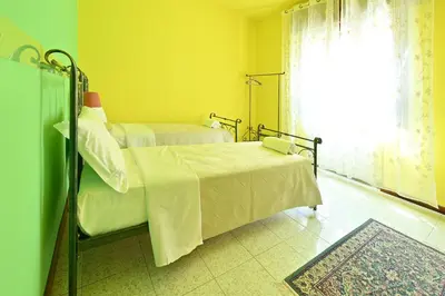 Letto o letti in una camera di Ca' Piraghetto 3 bedroom apartment