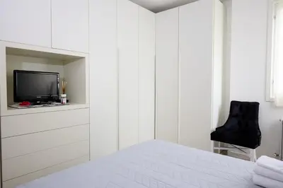 Letto o letti in una camera di Art-inn