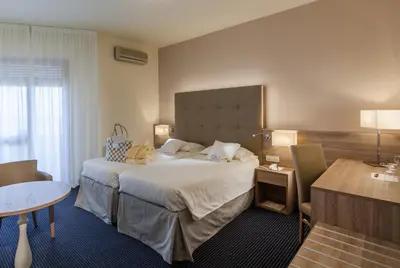 Letto o letti in una camera di Hotel Garden Terme