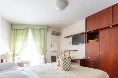 Letto o letti in una camera di Hotel Garden Terme