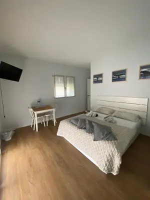 Letto o letti in una camera di Room259