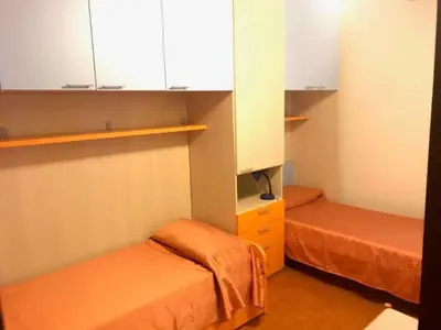 Letto o letti in una camera di Apartment in Lido di Jesolo 54503