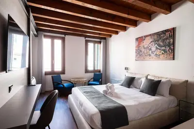 Letto o letti in una camera di GuestHost - Santo 86 Luxury Rooms