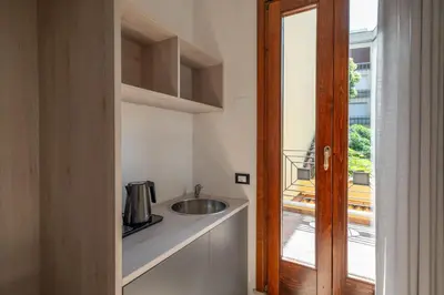 Cucina o angolo cottura di GuestHost - Santo 86 Luxury Rooms