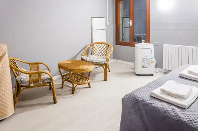 Letto o letti in una camera di room with private bathrooms diedo 2