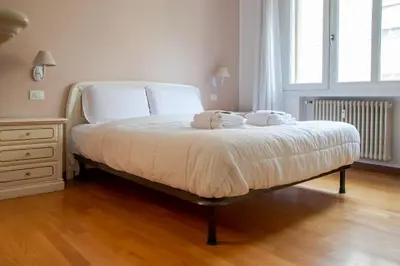 Letto o letti in una camera di Welc-ōM Urban Nest Padova