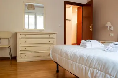 Letto o letti in una camera di Welc-ōM Urban Nest Padova