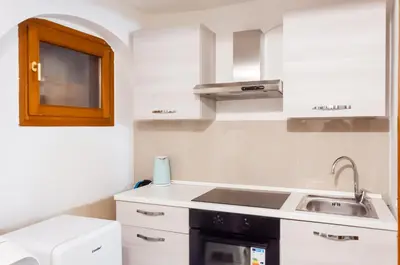 Cucina o angolo cottura di room with private bathroom Stella 1