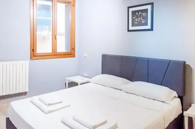 Letto o letti in una camera di room with private bathroom Stella 2