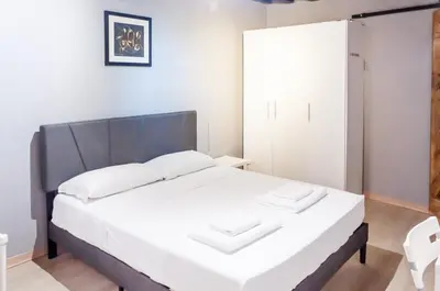 Letto o letti in una camera di room with private bathroom Stella 2