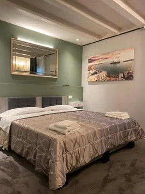Letto o letti in una camera di Ca' Elisabetta, Romantic Suite