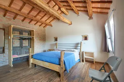 Letto o letti in una camera di Da Brussio