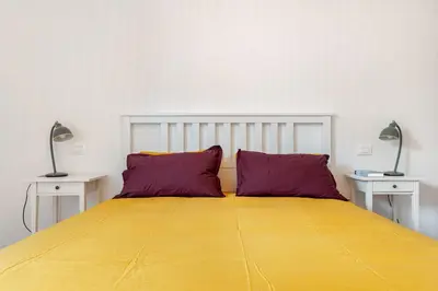 Letto o letti in una camera di Golden House Venice Yellow - Mirano