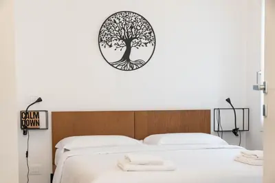 Letto o letti in una camera di Elegant City-Center Apartment in Villa - Private Parking